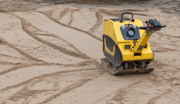 Sand compactor