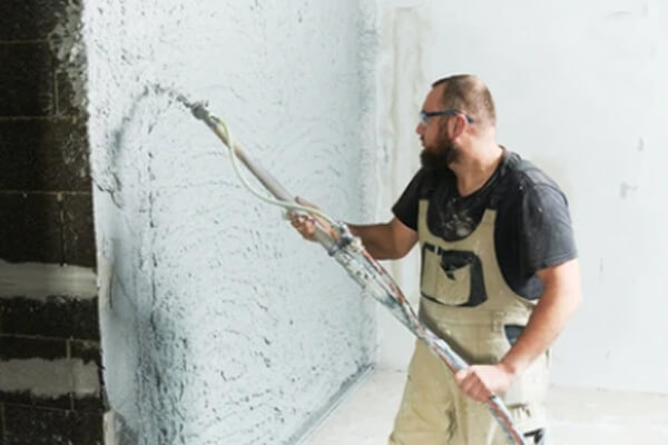Spray plaster