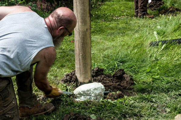 Should you fill fence posts with concrete