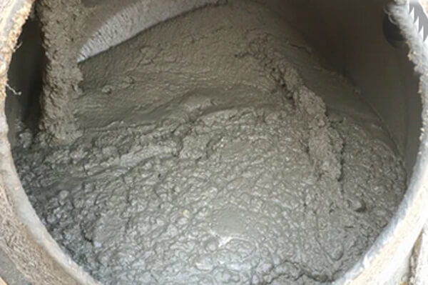 Mix concrete in a mixer